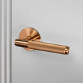 Buster and Punch Door Handle Set Passage Cross Knurl in Warm Sunset