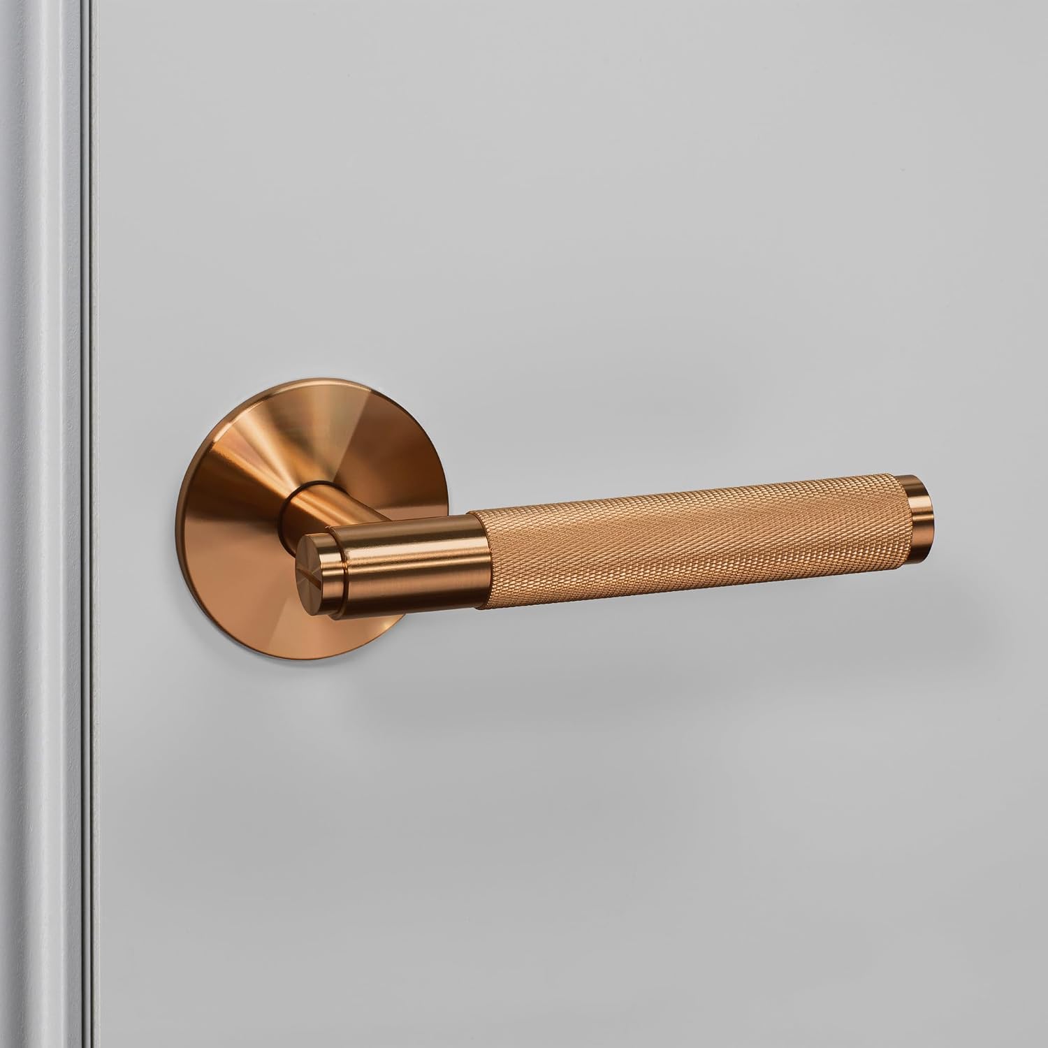 Buster and Punch Door Handle Set Passage Cross Knurl in Warm Sunset