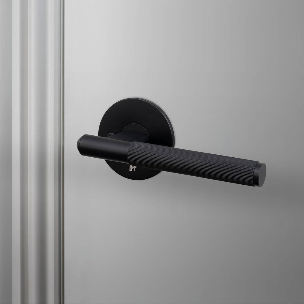 Buster and Punch Door Handle Set Privacy Linear Knurl Welders in Black