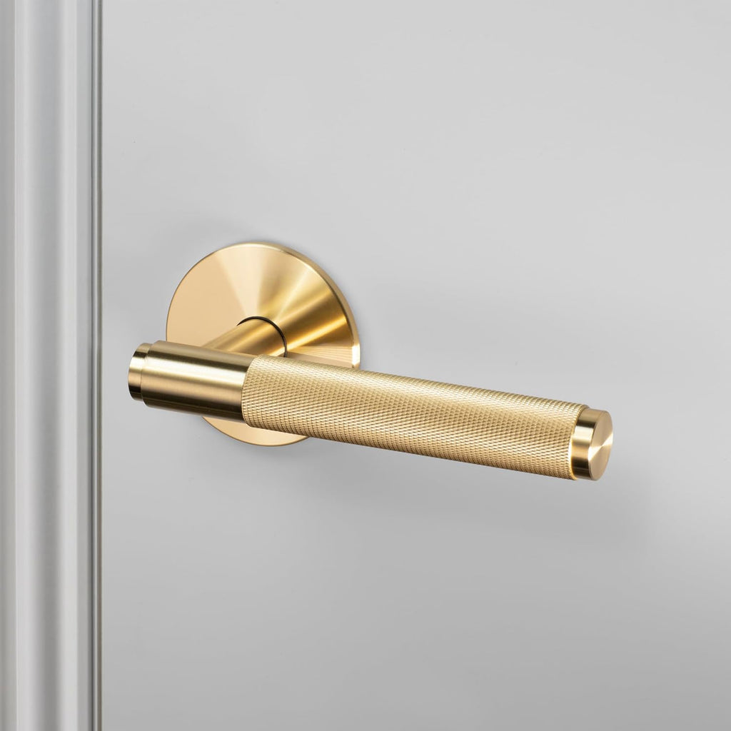 Buster and Punch Door Handle Set Passage Cross Knurl in Brass