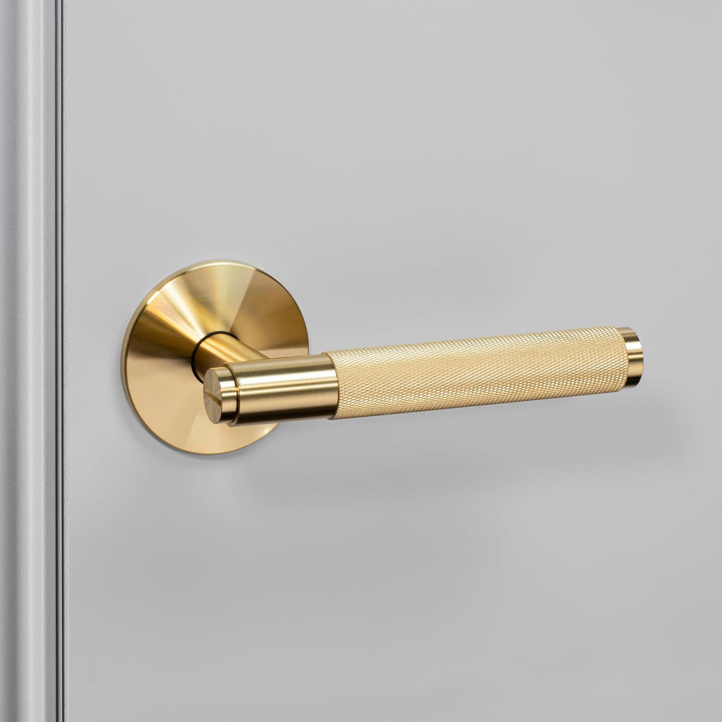 Buster and Punch Door Handle Set Passage Cross Knurl in Brass