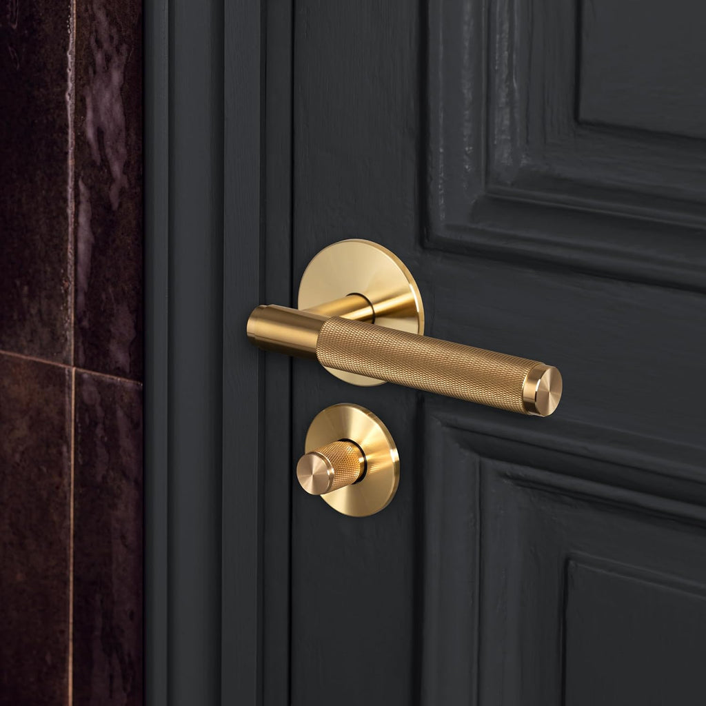 Buster and Punch Door Handle Set Passage Cross Knurl in Brass